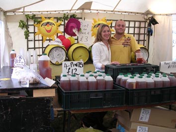 Xav and Lesley at the Bestival Selling Ventnor Beer